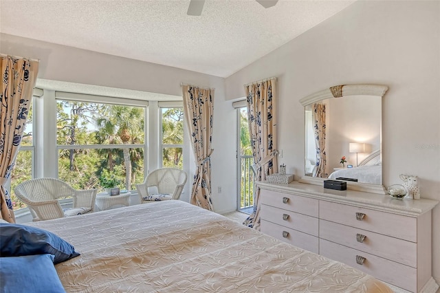 carpeted bedroom featuring lofted ceiling, a textured ceiling, a ceiling fan, and access to outside