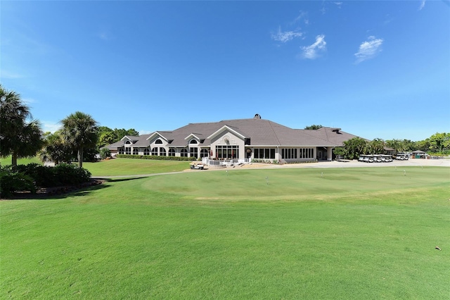 view of community featuring a lawn