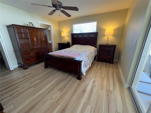 bedroom featuring light wood-style flooring, baseboards, and ceiling fan