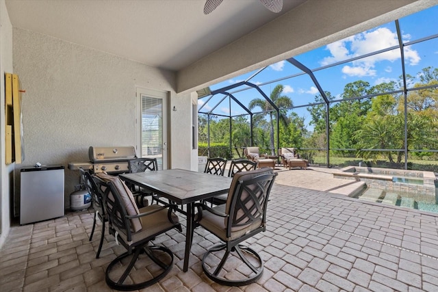 view of patio / terrace featuring outdoor dining area, a grill, glass enclosure, and a pool with connected hot tub