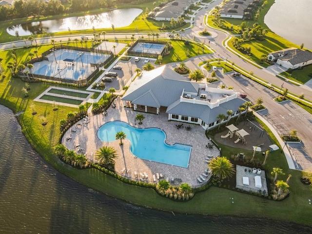 bird's eye view with a water view