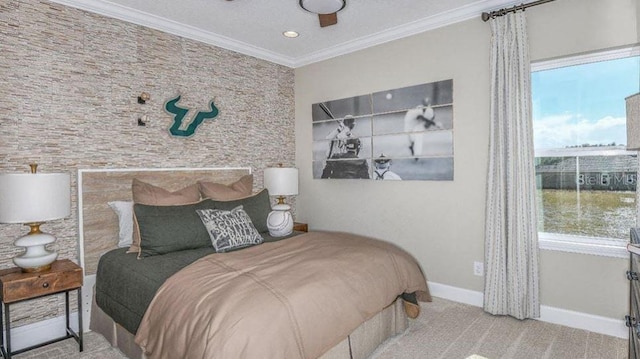 bedroom featuring multiple windows, carpet, and ornamental molding