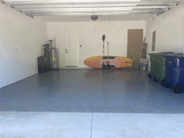 garage with electric panel and electric water heater