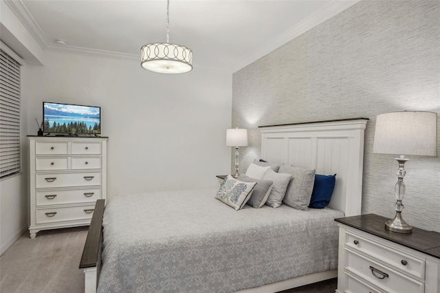 bedroom with crown molding and carpet floors