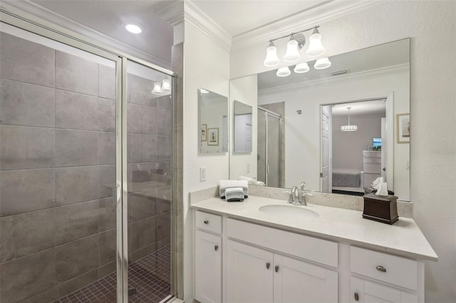 bathroom with vanity, crown molding, ensuite bathroom, and a shower stall