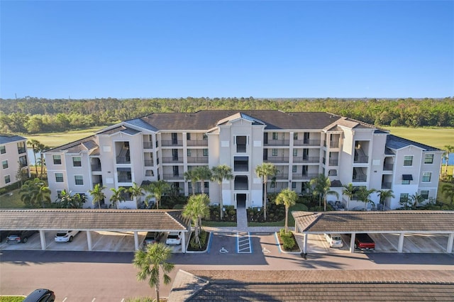 view of property with covered parking