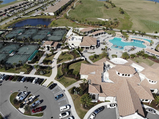 birds eye view of property featuring a water view and a residential view