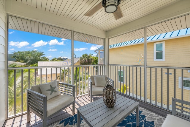 wooden deck with ceiling fan