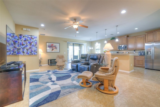 living room featuring recessed lighting, visible vents, baseboards, and ceiling fan