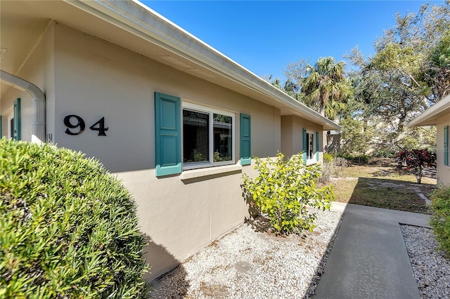 exterior space with stucco siding