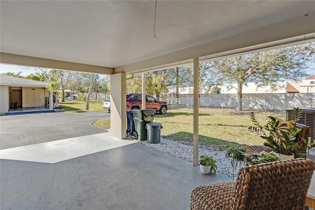 view of patio / terrace featuring fence