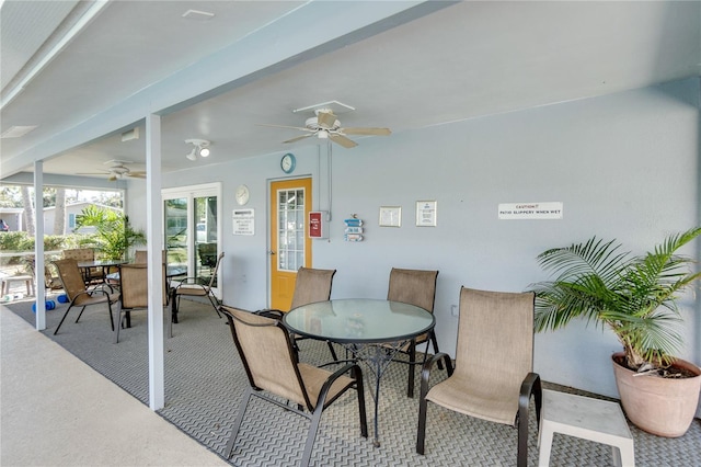 view of patio / terrace featuring outdoor dining space and ceiling fan