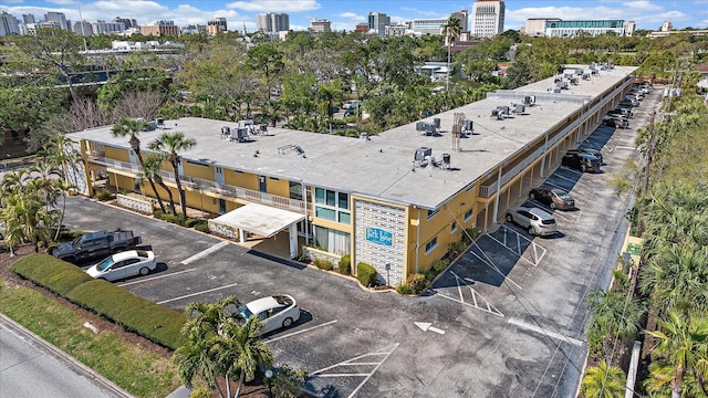 birds eye view of property with a view of city