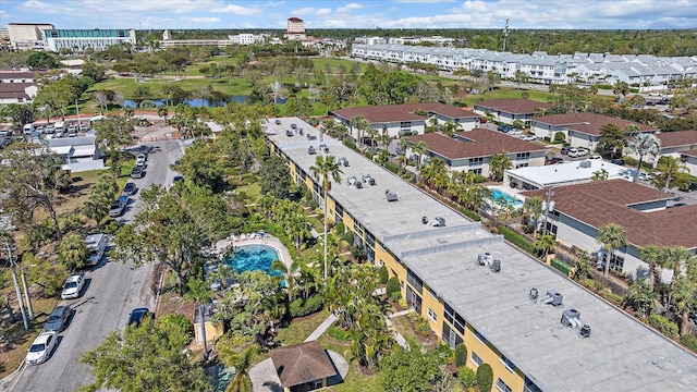 aerial view with a residential view and a water view