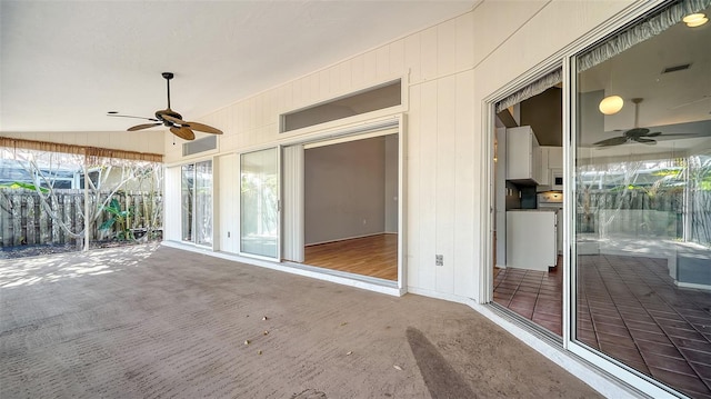 view of patio featuring visible vents, a ceiling fan, and fence