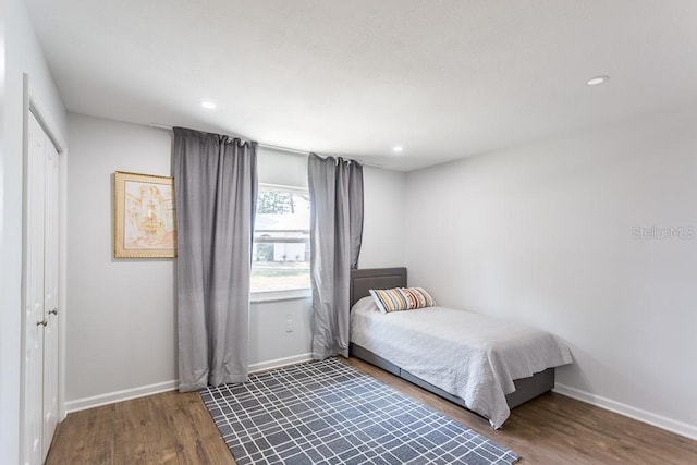 411 S Oxford Dr Unit 411, Nokomis, FL 34275 - bedroom featuring recessed lighting, wood finished floors, baseboards, and a closet