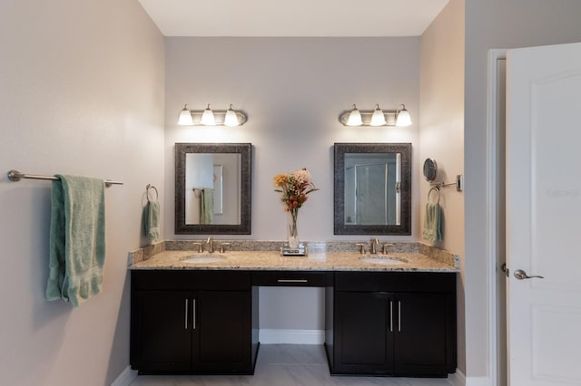 full bath with a sink and double vanity