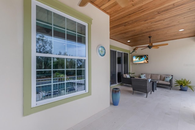 view of patio with a ceiling fan and outdoor lounge area