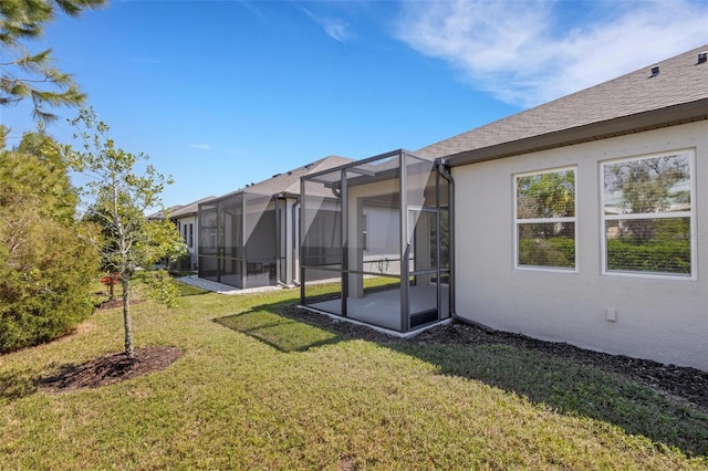 view of yard featuring a lanai