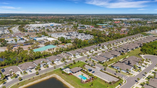 birds eye view of property with a residential view