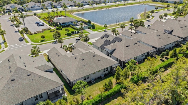 bird's eye view featuring a residential view and a water view