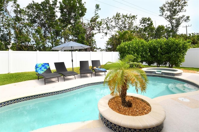 view of swimming pool with a patio area, a fenced in pool, an in ground hot tub, and a fenced backyard