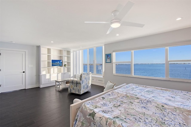 bedroom featuring dark wood finished floors, recessed lighting, a ceiling fan, and baseboards