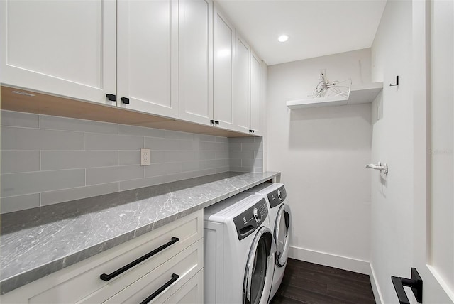 laundry area with dark wood-type flooring, baseboards, recessed lighting, washer and dryer, and cabinet space