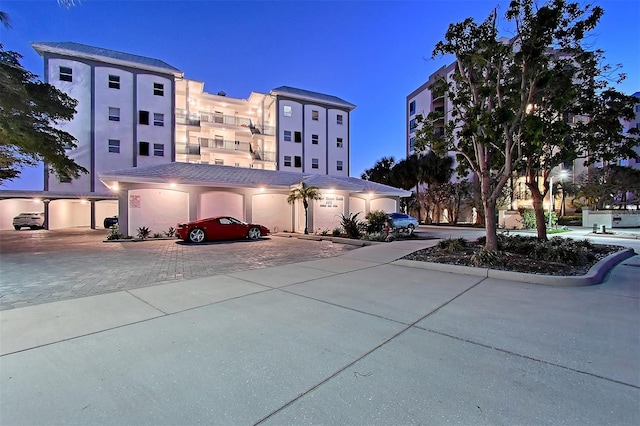 view of building exterior with driveway