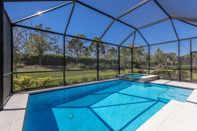 view of swimming pool with glass enclosure, a patio, and a pool with connected hot tub