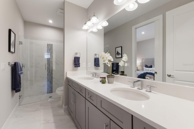 ensuite bathroom featuring ensuite bath, a stall shower, marble finish floor, and a sink