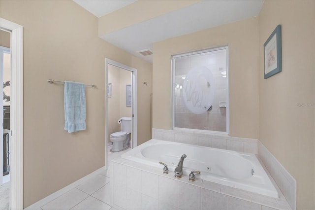 full bathroom with tile patterned flooring, visible vents, baseboards, toilet, and a tub with jets