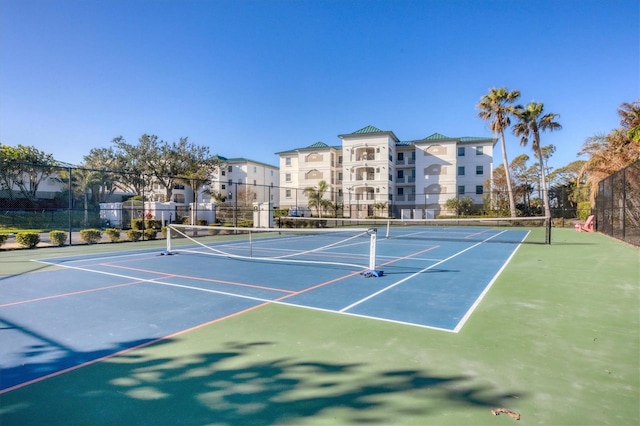 view of sport court with community basketball court and fence