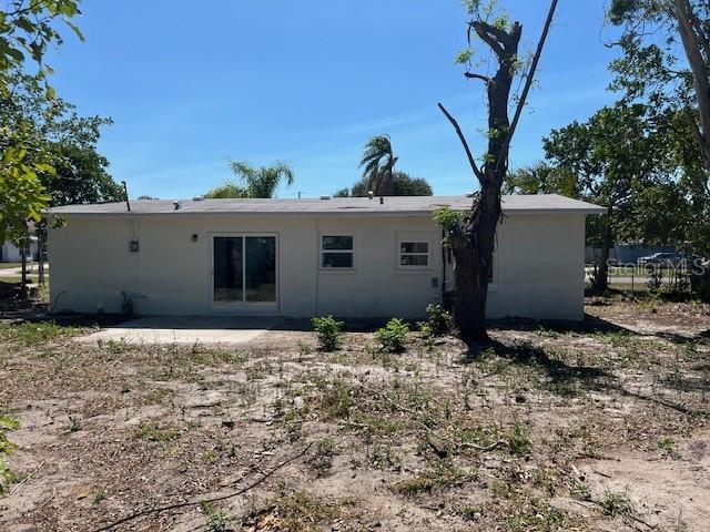 rear view of property featuring a patio