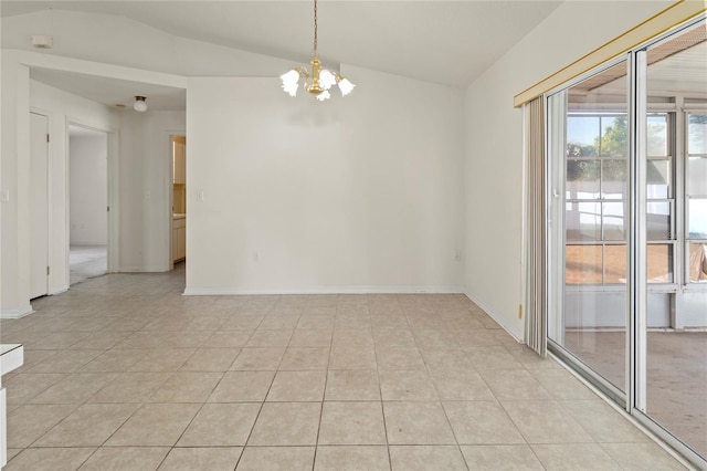 spare room with vaulted ceiling, a notable chandelier, baseboards, and light tile patterned floors