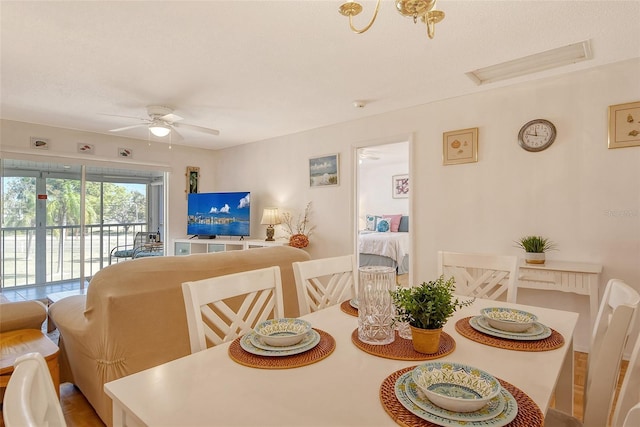 dining area featuring ceiling fan