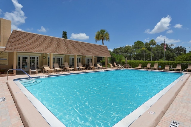 pool featuring a patio and french doors