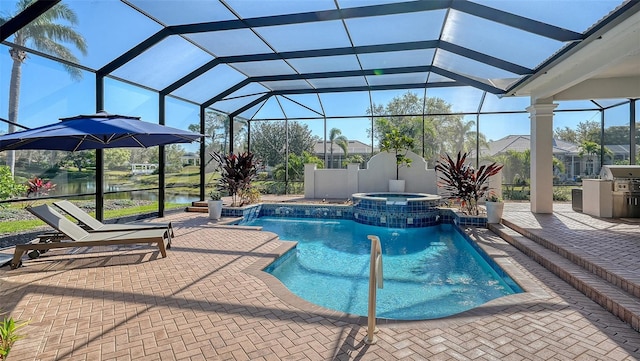 view of pool with glass enclosure, a patio area, and a pool with connected hot tub