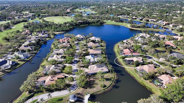 birds eye view of property featuring a residential view and a water view