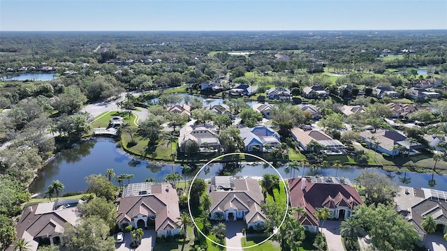 aerial view featuring a residential view and a water view