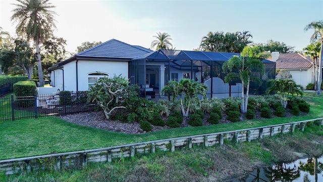 7340 Barclay Ct, University Park, FL 34201 - view of front of home featuring glass enclosure and stucco siding