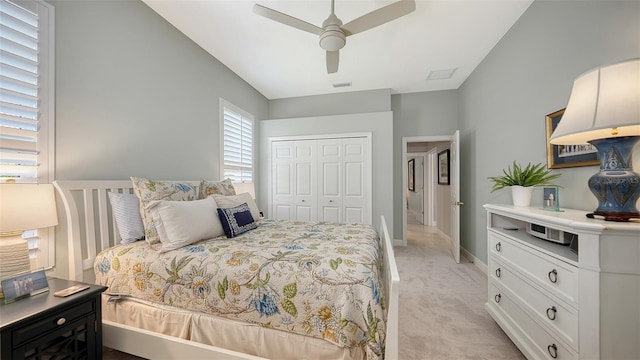 7340 Barclay Ct, University Park, FL 34201 - bedroom with light carpet, a closet, baseboards, and a ceiling fan