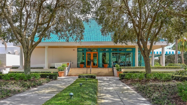 7340 Barclay Ct, University Park, FL 34201 - view of front facade featuring french doors and stucco siding
