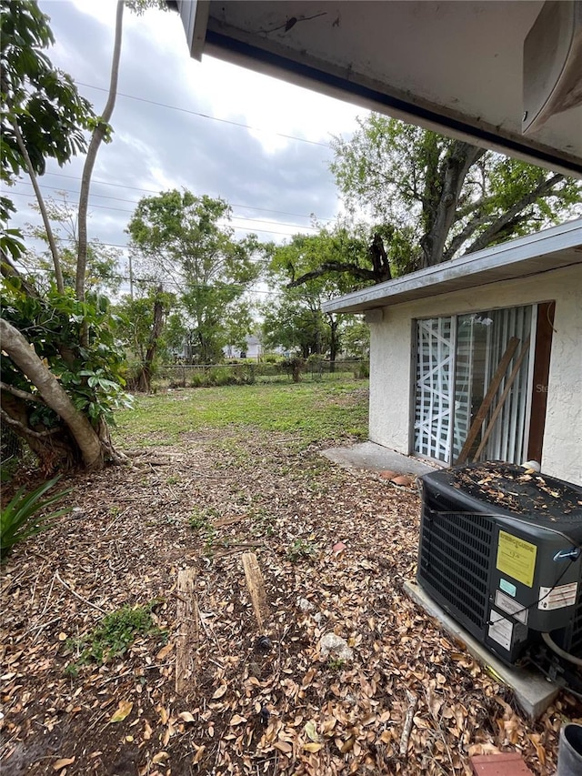 view of yard featuring central AC