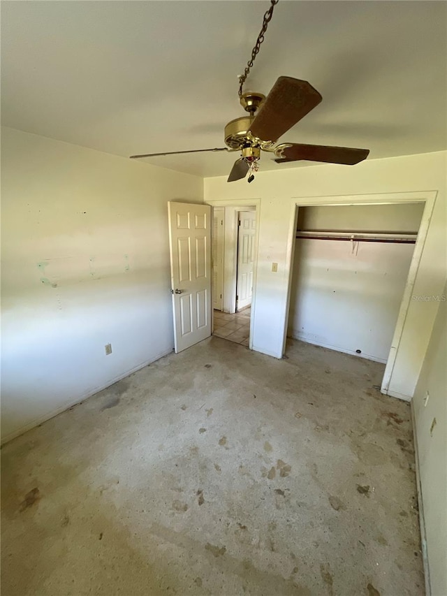 unfurnished bedroom featuring a closet and a ceiling fan