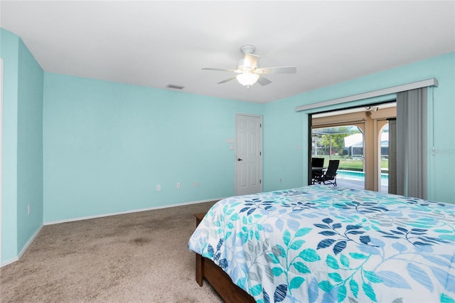 carpeted bedroom with access to exterior, baseboards, visible vents, and ceiling fan