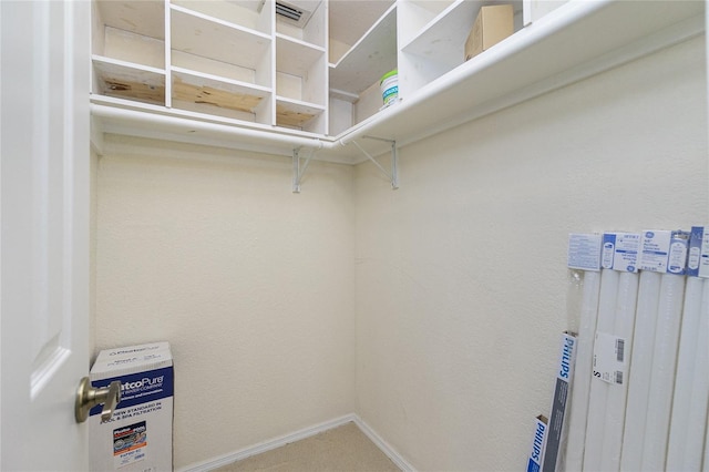 walk in closet featuring visible vents