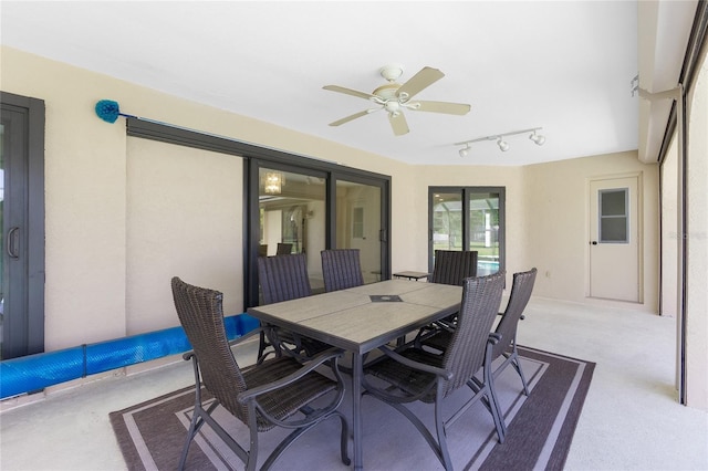 view of patio / terrace with outdoor dining area and ceiling fan