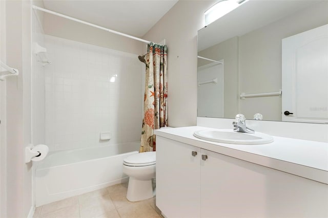 bathroom featuring tile patterned floors, vanity, toilet, and shower / tub combo