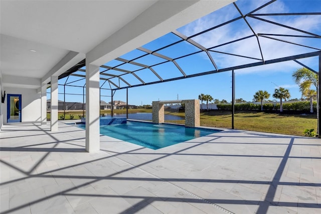 outdoor pool with a yard, glass enclosure, and a patio